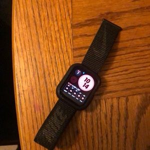 Used Apple Watch it’s a Nike brand sport water proof have its charger with it.